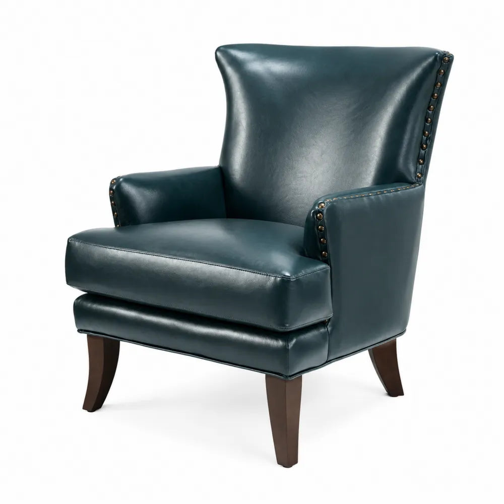 Poltrona in pelle blu con gambe in legno